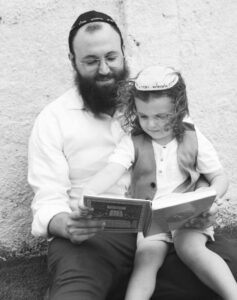 Rabbi David Atar with his son